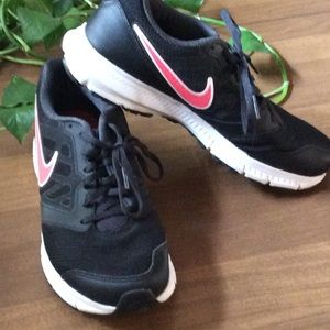 black nike with pink swoosh